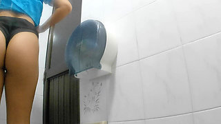 Athletic Girl Pissing in Public Bathroom