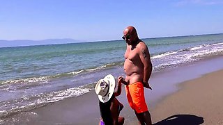 Fucking a teen outside on the public beach
