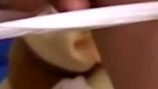 Sexy brunette masturbating with her dildo toy in close up