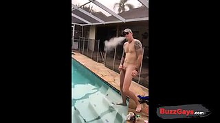 Muscular Hunk Jerks Off by the Pool with a Cigarette