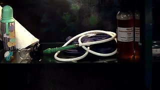 Blond Latex Nurse Investigates Her Blondie Patient With Enema, Speculum And Suction Cups