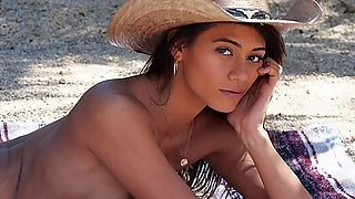 Petite Asian teen Hannah Le gets naked on a relaxing ranch for Playboy