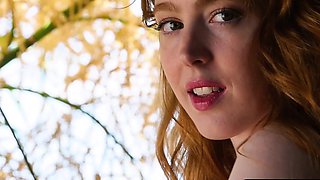 Slender hairy redhead MILF strips naked