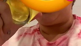 HORNY GRANNY DRINKS HER OWN PISS