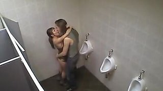 Horny babe fucked in the men's room!