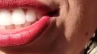 Smoking with Her Breasts Out