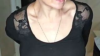 Busty babe playing with her big boobs