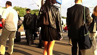 Street voyeur finds a pretty brunette with sexy slim legs