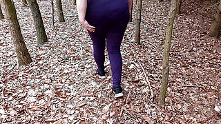 Topless in the forest - slapping her tits hard