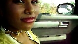 Kinky slut masturbates cock in a car