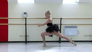 Slender ballerina Dora Tornaszkova gets naked and shows yummy pussy