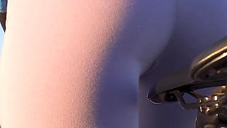 Teen Japanese Riding a Bicycle and Showing off Her Ass in Tight Leggings