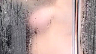 Busty Babysitter Takes a Shower.