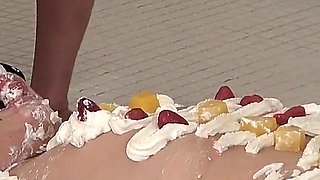 Female Body Cake. Mistress Spreads Cream on Female Slave's Body and Makes Her Lick Her Whole Body as Food for Male Slaves