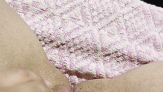 Inserting a small cup into the wet pussy