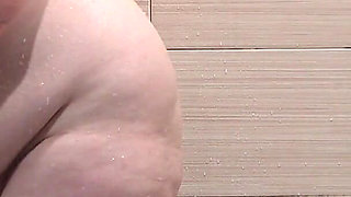 A Mature Stepmom Masturbates While Taking a Shower. a Home Camera in the Bathroom Watches the Chubby MILF.