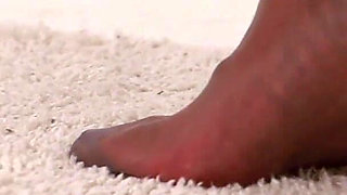 Lola’s Nylon Feet on the Barstool