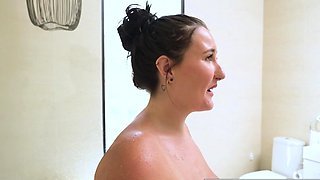 Chubby busty girls have lesbian sex in the bathroom