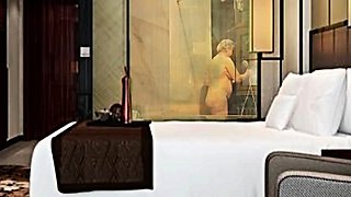 My grandmother is taking a bath at the hotel.