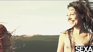 Redhead and beuntte lesbians with perfect bodies have amazing lesbian duo on the beach