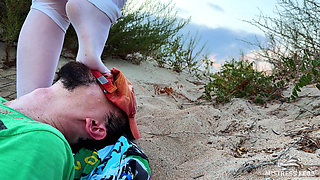 Mistress Pisses Straight Into Slave's Mouth on Wild Beach