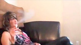 Ballbusting smoking model kicks male femdom slave