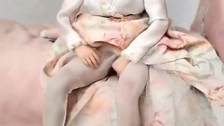 Cynthia Undresses on Bed