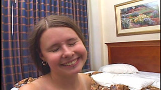 Tattooed babe gets her huge tits and bush screwed by two men with hard dicks on the bed