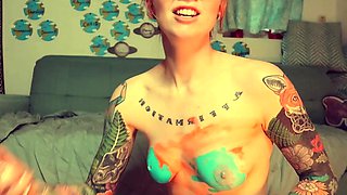 Amateur redhead Jacqueline with glasses masturbates