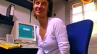 Sexy German secretary sucks and jerks off a dick in the office