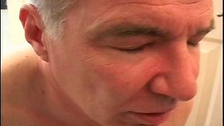 Old man gets ass pegged by a busty mistress and eats his cum from the toilet