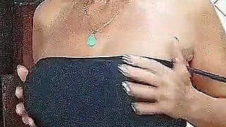 Lonely Hostess in the Kitchen Shows the Beauty of Her Old Sexy Body in Front of a Webcam