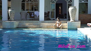 Big dildo in the ass of a beautiful Lisichka Mila Fox in the pool