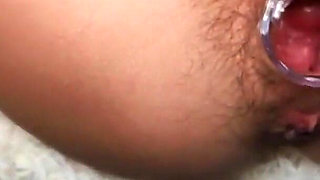 Open pussy using a speculum_orgasm in close up during
