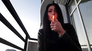 Smoking fetish from sexy Dominatrix Nika. Pretty woman blows cigarette smoke in your face