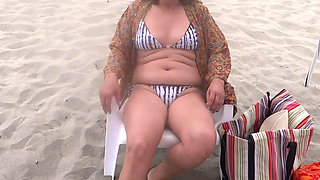 I Love Showing off on the Beach in a Bikini and Watching How I Make Cocks Hard, I'm a 58-year-old Ma