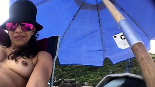 First-time Nudist Hesitates to Undress on Beach