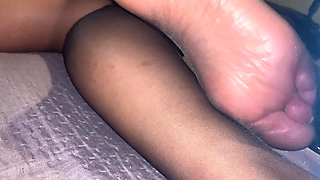 Feet in black pantyhose to jerk off and cum