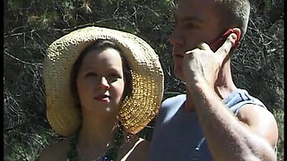 A Couple Copulates Like Savages in a Corner of the Field