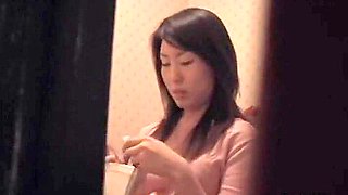 caught a spicy Japanese babe masturbating in the toilet