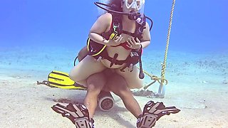 Bizzare sex session during SCUBA diving. She takes a huge cock while being 100m underwater