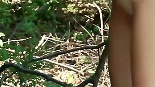 Skinny Babe Cutting Her Rubber Boots and Discaring Them Naked in the Woods, Since She Doesn't Need Them