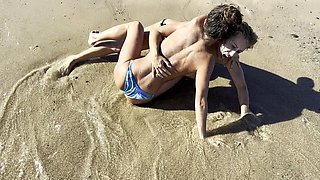 Lesbian Couple Fighting for Domination on the Beach