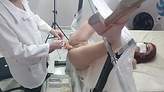 Bound babe is getting used by her horny gynecologist in her pussy