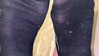 Sexy leggy brunette enjoys foot fetish