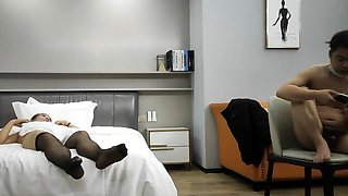 Cute amateur asian web cam girl playing with her toy