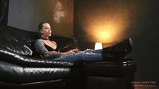 Anette Smokes in Jeans and Boots 4K