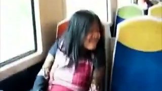 Asian girl fingers herself on public train