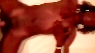 African babe gives titjob and rides white cock