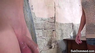 Femdom babe masturbates next to gagged slave